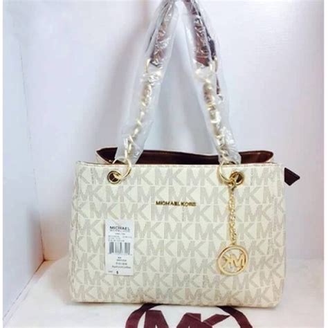 mk bags replica online uk|michael kors purse logo.